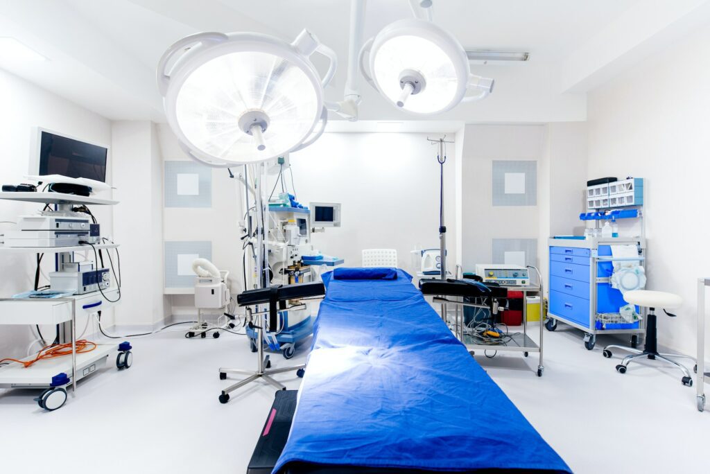 Close up details of hospital interior. Operating room with surgery lamps and medical equipment